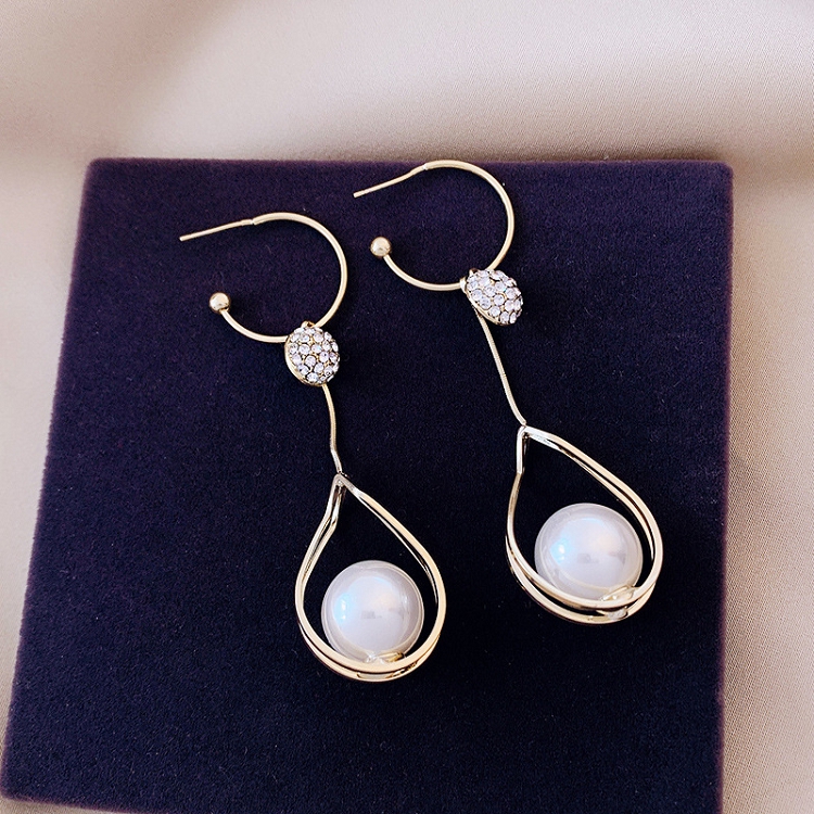Earrings female niche design long pearl fashion earrings French high quality goddess style retro silver earrings 
