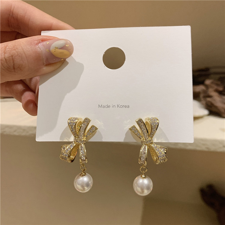 S925 silver needle fine micro inlaid zircon bow long pearl tassel earrings feminine fashion earrings wholesale 
