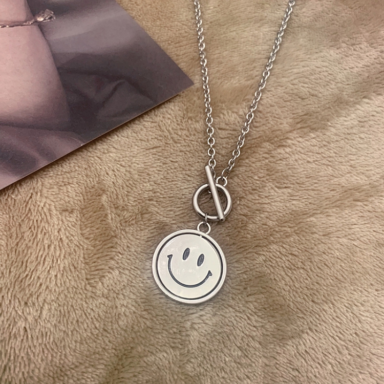 Trendy hip hop rotary smiling face titanium steel necklaces for men and women with instagram simple retro personality emoji pendants for lovers ?